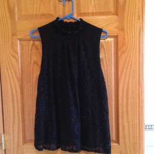 Woman’s black dressy tank.